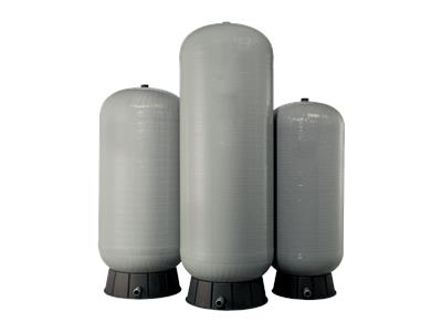 Three gray fibreglass pressure tanks designed for controlling pressure in domestic, commercial, and industrial applications.